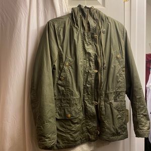Hooded Olive green army jacket with cream colored interior
